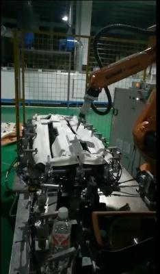 RB08搬运机器人在浙江宁波实现汽车内饰自动切割飞边的应用